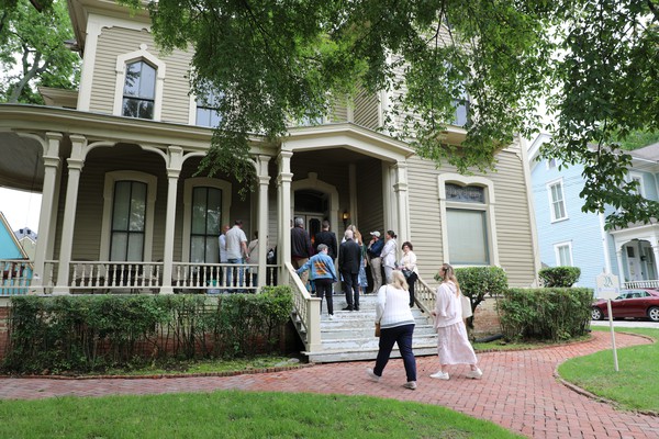 Tour guests enter the Johnson house-featured on tour