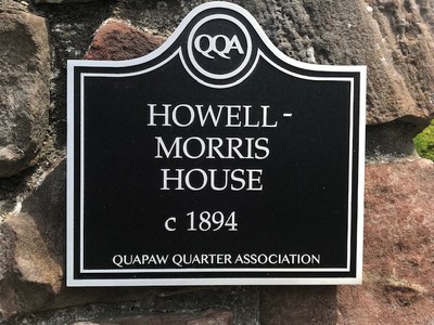 Wall mounted QQA historic marker sign